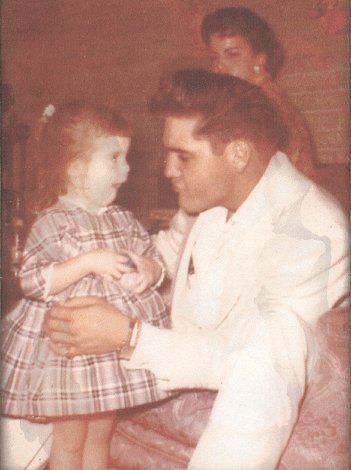 Elvis with daughter - SpotifyThrowbacks.com
